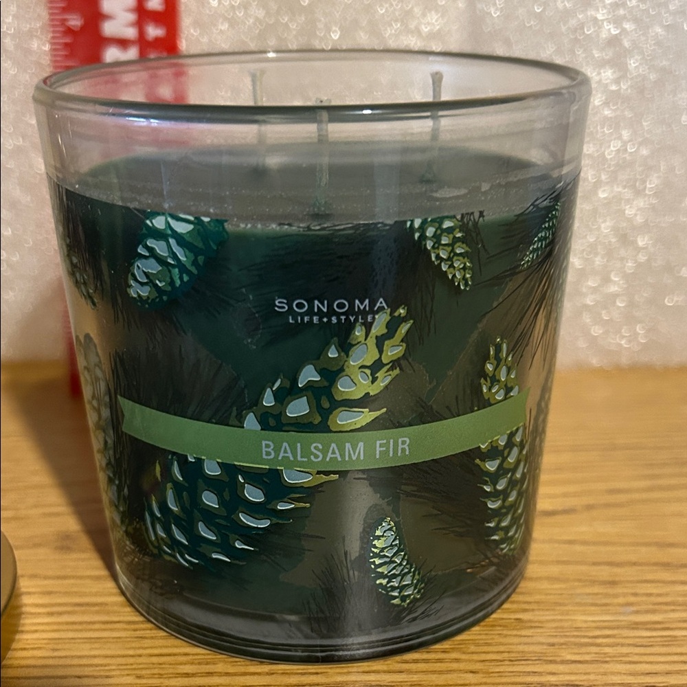 Sonoma Balsam Fir Candle with Pine Cone Design. Brand new!